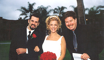 Photo of Drew with newlyweds Trae and Jen